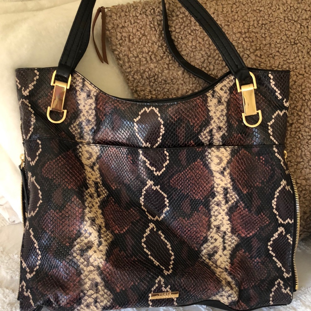 Brand new with dust bag